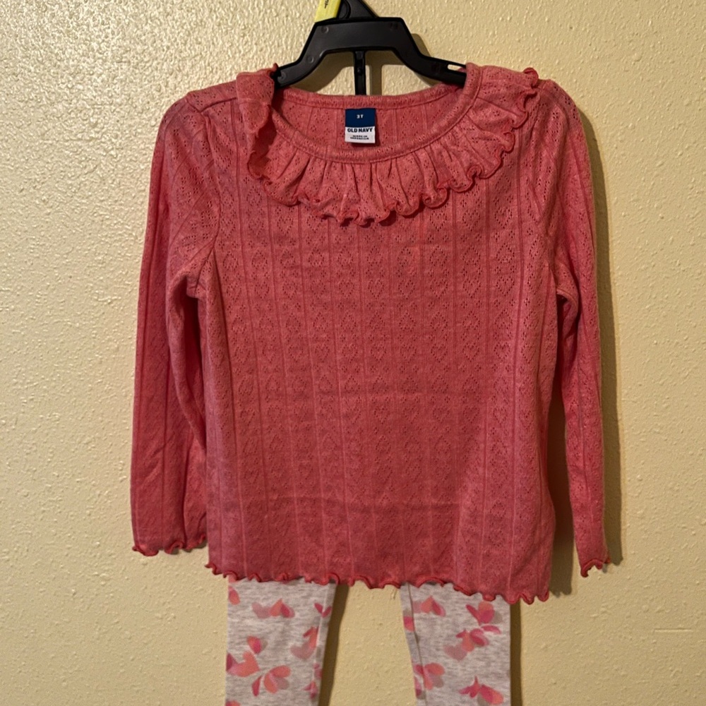 Pink Ruffled Girls' Sweater by Old Navy
Leggings by OshKosh